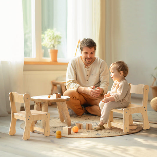 Father and toddler sitting together in a warm sunlit room with ROBUD birch plywood toddler chairs and round white table with small wooden blocks