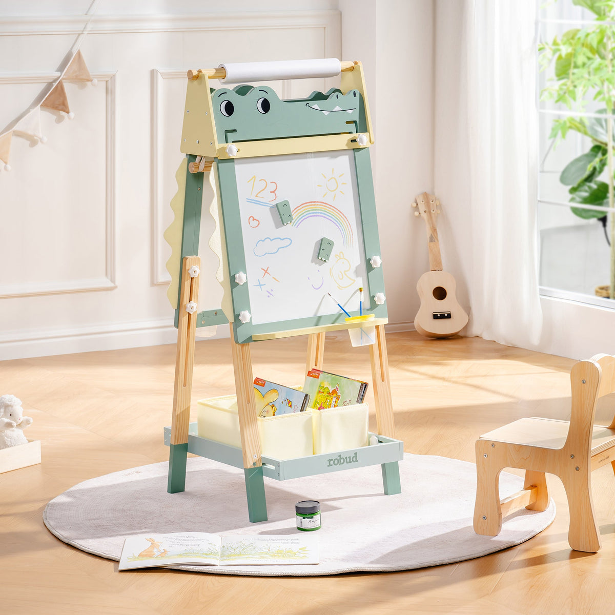 ROBUD Wooden Crocodile Easel full product view with accessory bags in a Scandi-style playroom