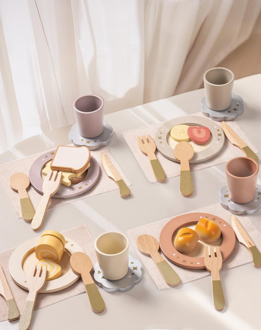 ROBUD wooden play dishes overhead flat lay on linen cloth with scattered lemon and food toy pieces