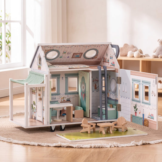 Wooden camper van dollhouse with its side wall swung open to show the furnished rooms, two wooden chairs and a small table on a green mat in front, on a round jute rug by a window