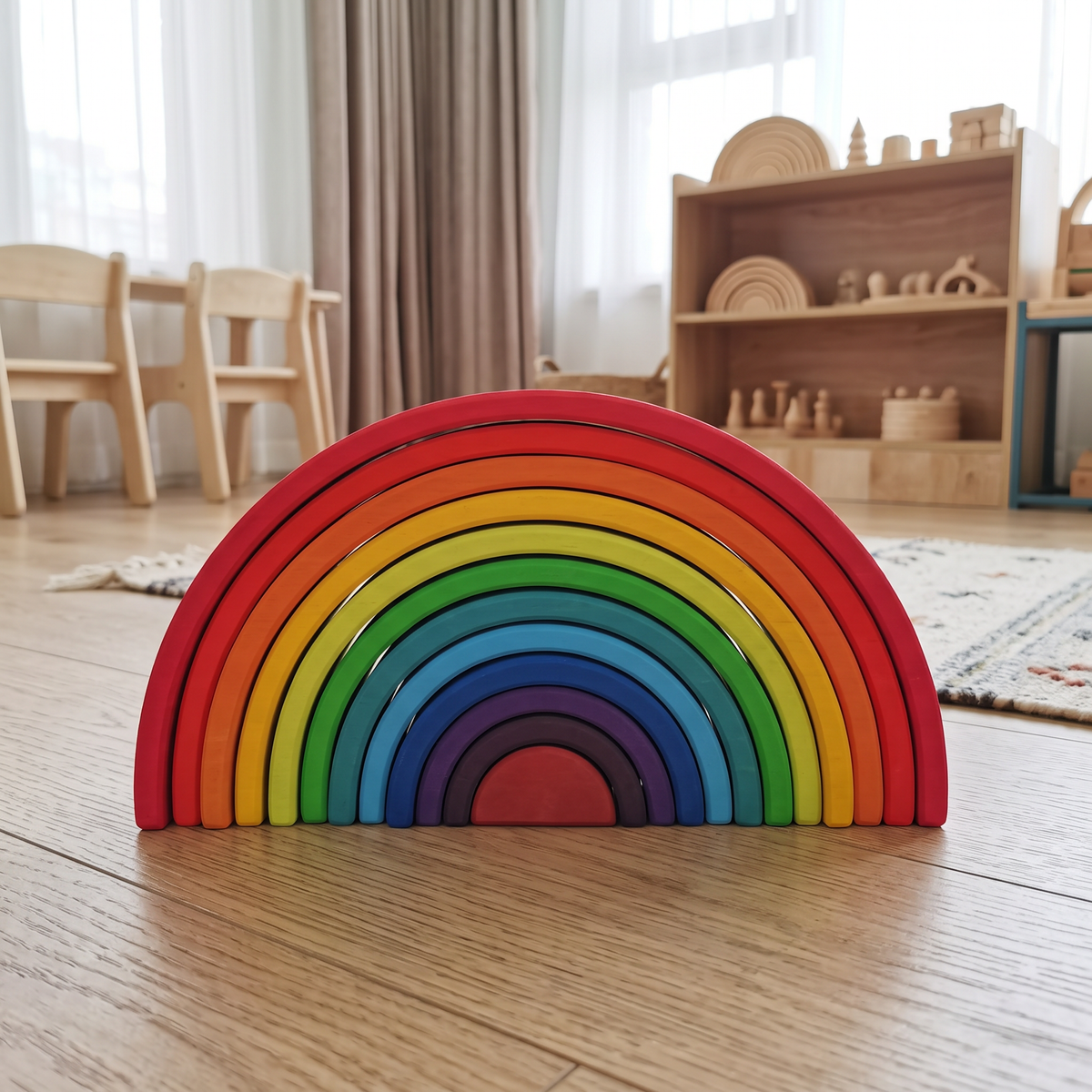 Rainbow 12-piece nested arch stacker assembled in a Montessori playroom (rainbow 12 colorway)