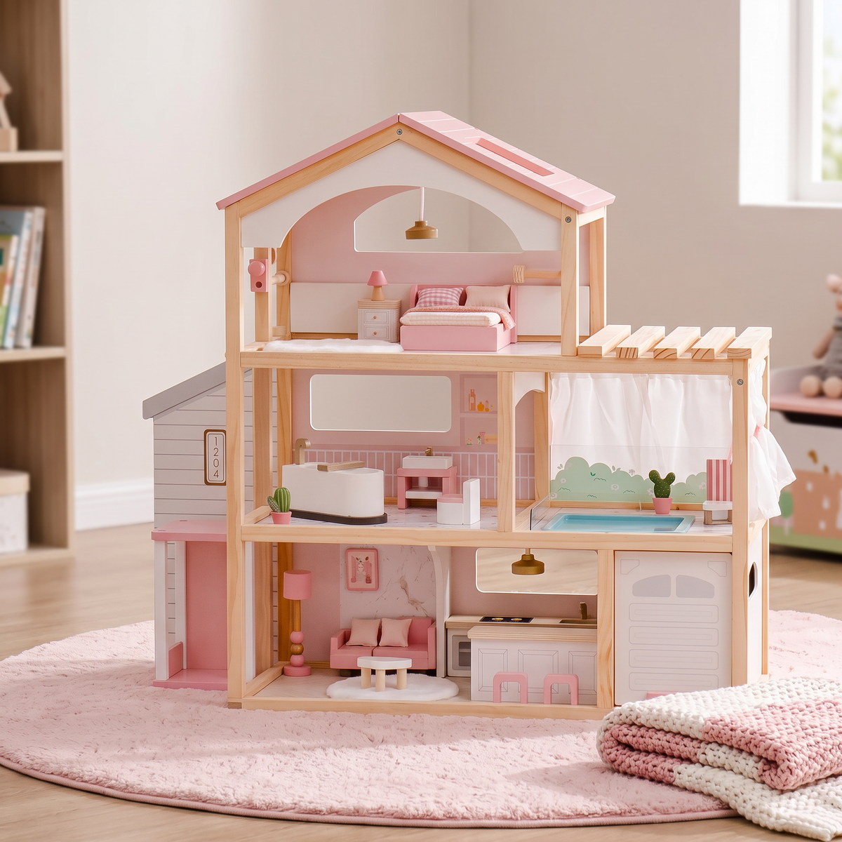 Pink and natural wood three-story open-concept dollhouse angled view in a child's bedroom corner with a round rug, no people